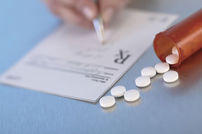 prescription pad and pills